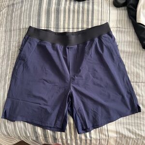 Fabletics Fundamental Short Mens XL Blue Lined Stretch Gym Pockets Active 9"